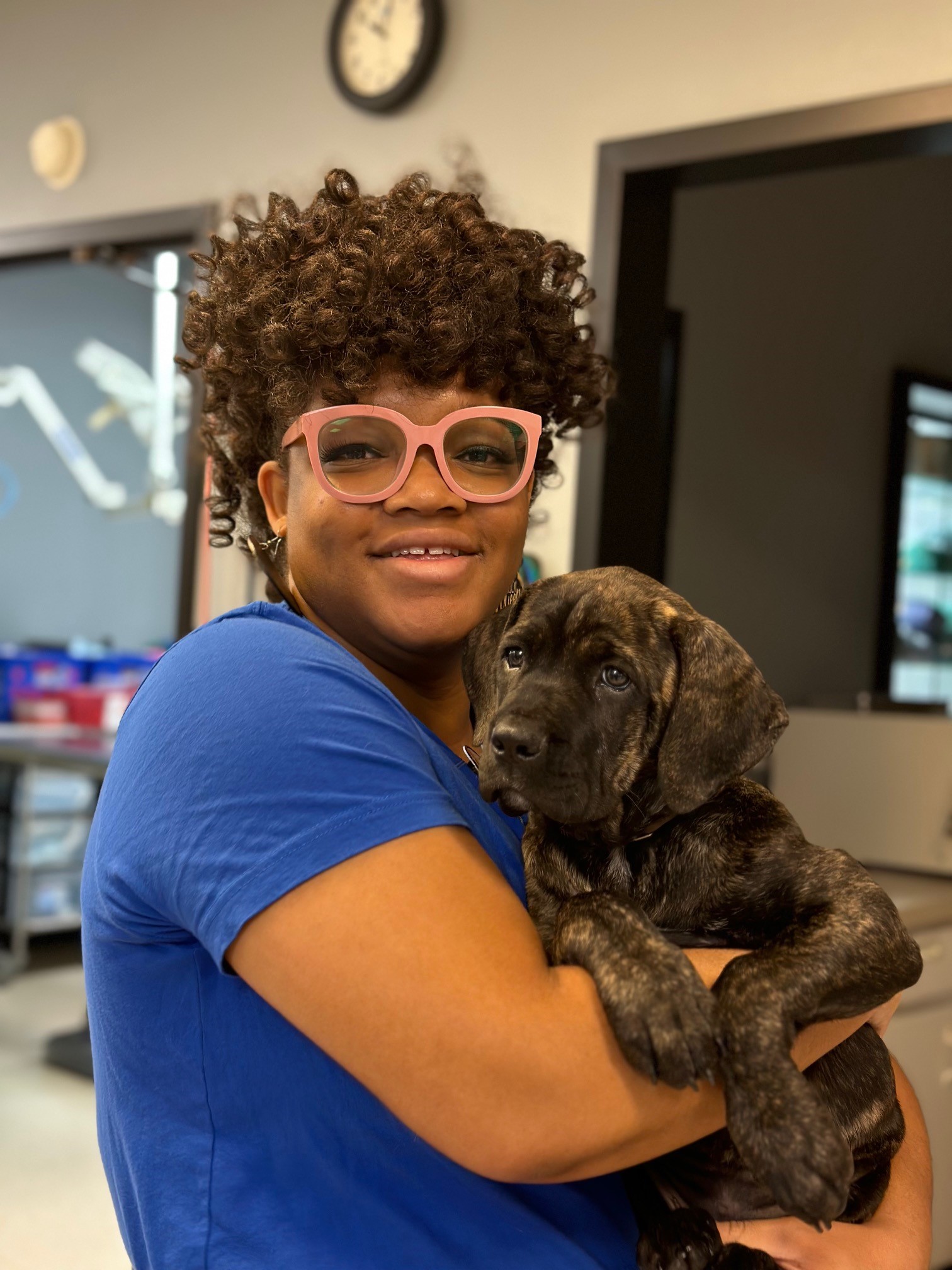 Erica hold a puppy